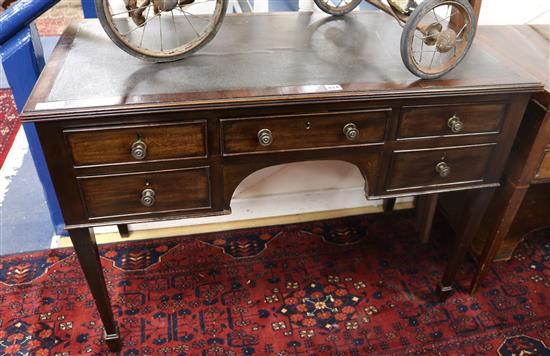 An Edwardian mahogany writing table W.109cm